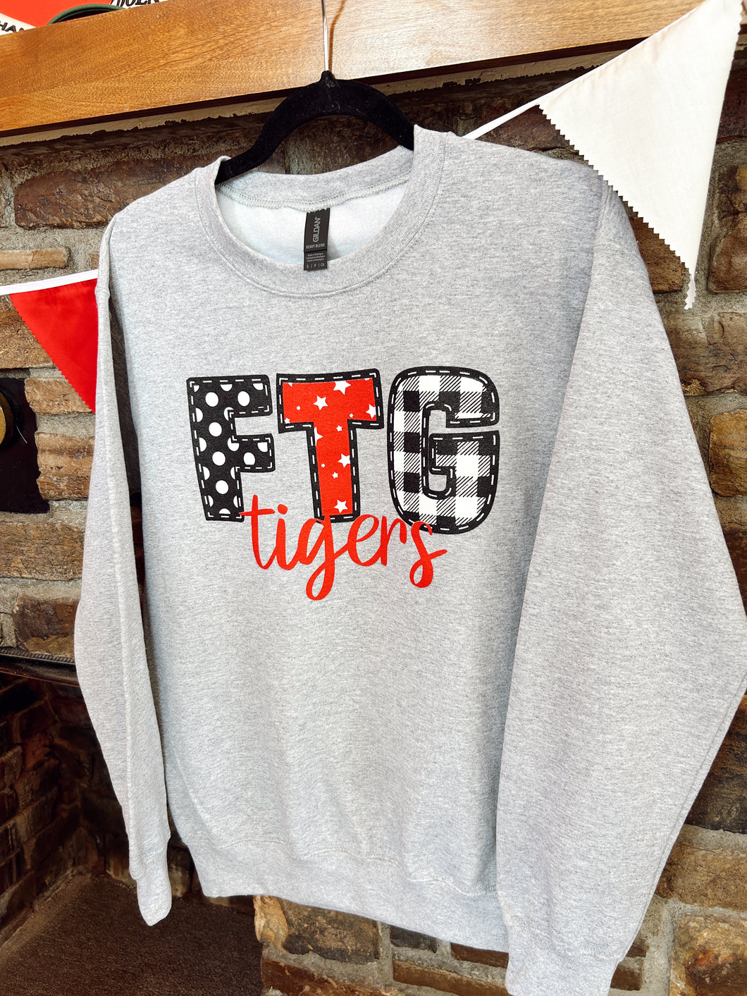 Polka dot, star, and plaid Tiger sweatshirt